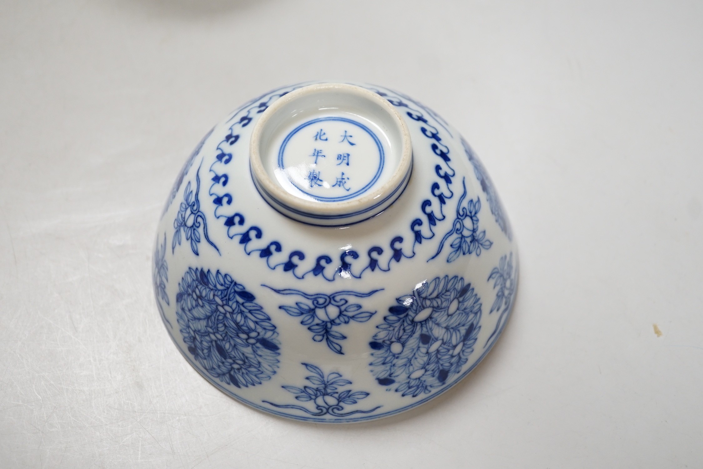 A Chinese underglaze copper red meiping a.f. and a Chinese blue and white bowl. Tallest 15cm